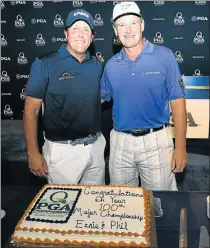  ?? Picture: GETTY IMAGES ?? TONS OF LUCK: Veterans Phil Mickelson, left, and Ernie Els will each make his 100th major start today at the PGA Championsh­ip