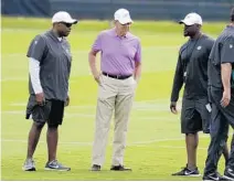  ?? LYNNE SLADKY/AP ?? The Dolphins have embraced the tank, as directed by, from left, general manager Chris Grier, owner Stephen Ross and coach Brian Flores.