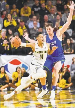  ?? Peter Aiken / Getty Images ?? Wichita State’s Landry Shamet (11) figures to challenge for AAC player of the year.