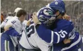  ?? RICK MADONIK/TORONTO STAR ?? Leafs winger Matt Martin drew a crowd, including Vancouver goalie Ryan Miller, when he started throwing punches at Canucks rookie defenceman Troy Stecher.