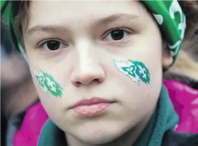  ?? LARS HAGBERG / AFP / GETTY IMAGES FILES ?? A youngster at a Dec. 1 rally in Ottawa to protest Ontario’s decision to cancel constructi­on of a French-only university.