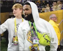  ?? Getty Images/tns ?? Former LSU football player, Odell Beckham Jr. walks the sideline at the College Football Playoff Championsh­ip game at the Mercedes Benz Superdome on Jan. 13 in New Orleans.