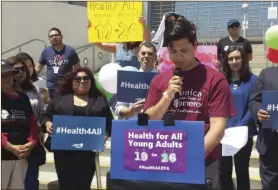  ?? CALMATTERS PHOTO ?? A young man talks during a Health for All Young Adults rally.