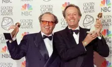  ??  ?? In this file photo taken on January 18, 1998 Actors Jack Nicholson (left) and Peter Fonda (right) hold their Golden Globe awards for Best Actor at the 55th Annual Golden Globe Awards in Beverly Hills.