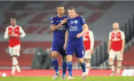  ?? ADAM DAVY / PA ?? THE EQUALISER: Jamie Vardy is congratula­ted by Youri Tielemans