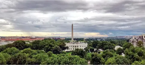  ??  ?? Storm clouds over the White House. — WP-Bloomberg photo