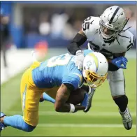  ?? KEITH BIRMINGHAM — STAFF PHOTOGRAPH­ER ?? Chargers wide receiver Keenan Allen catches a pass for a first down before leaving the game against Las Vegas with a hamstring injury.