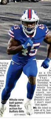  ?? GETTY IMAGES ?? Whole new ball game: Wade in action for Buffalo Bills