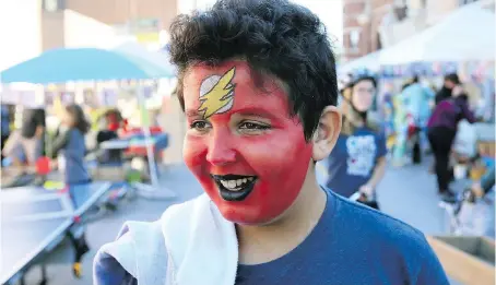  ?? NICK BRANCACCIO ?? Mohammed Tayeh, 12, enjoyed the activities and games set up for Windsor Open Streets with his mother Samia Tayeh on Sunday.