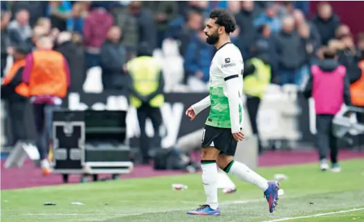  ?? (PA Wire/DPA) ?? Liverpool’s Mohamed Salah appears dejected following the English Premier League match against West Ham United at the London Stadium on Saturday. The teams shared a 2-2 draw.