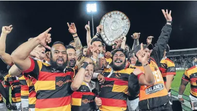  ?? PHOTO: GETTY IMAGES ?? Waikato celebrate their Ranfurly Shield win as well as avoiding relegation.