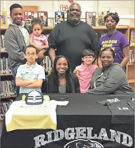  ??  ?? On hand to watch Ridgeland softball standout Haley Sandridge sign on to play at Chipola (Fla.) College were family members Ayden Lewis, Brayden Lewis, Kristie Lewis, Kobe Lewis, Jaelyn Lewis, Steve Lewis and Tashia Shelton. (Photo by Scott Herpst)