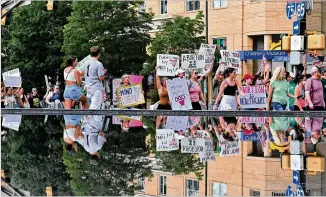  ?? HYOSUB SHIN/HYOSUB.SHIN@AJC.COM ?? Protesters march in June to protest the decision to overturn Roe v. Wade in Atlanta. Undocument­ed women’s limited autonomy over their reproducti­ve decisions in Georgia made national news in 2020, when detainees of an immigratio­n jail said they were pressured into unwanted hysterecto­mies.