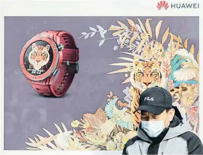  ?? Agèng SesB a rèllorsRG ?? Un anunci de Huawei Technologi­es per l’Any del Tigre a Xangai