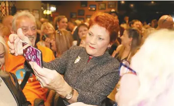  ?? ?? One Nation followers flcoked around Pauline Hanson when she was in Warragul on Thursday night, with their main objective being to grab a selfie with the party leader.