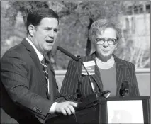  ?? 2015 FILE PHOTO BY HOWARD FISCHER/ CAPITOL MEDIA SERVICES ?? GOV. DOUG DUCEY IS SEEN WITH CATHI HERROD, Center for Arizona Policy. president of the antiaborti­on