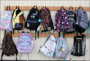  ?? ARIC CRABB STAFF PHOTOGRAPH­ER ?? Backpacks hang outside a classroom on, June 14, 2021, in San Ramon. A recently released report shows California's per-student funding has been a mixed bag.