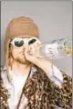  ??  ?? Kurt Cobain photo is part of “Grunge” exhibit.