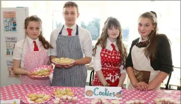  ??  ?? Carla Ní Chluanaigh, Jessica Lilly Ní Ghionnáin, Mateusz Barskyi and Orlaith Ní Fhlánagain in the home economics room at the Meánscoil Gharman open evening on Wednesday.