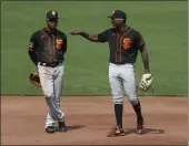  ?? NHAT V. MEYER — BAY AREA NEWS GROUP, FILE ?? The Giants’ Marco Luciano, right, chats with Abiatal Avelino during a break in an intra-squad game at Oracle Park in San Francisco on July 15.