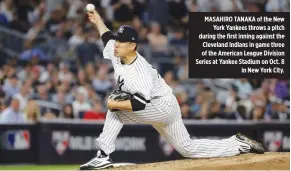  ??  ?? MASAHIRO TANAKA of the New York Yankees throws a pitch during the first inning against the Cleveland Indians in game three of the American League Division Series at Yankee Stadium on Oct. 8 in New York City.