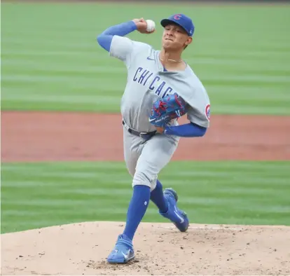  ?? GETTY IMAGES ?? Adbert Alzolay allowed two runs, including the go-ahead homer to Molina, and five hits and struck out six in seven innings.