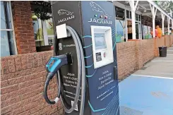  ?? KAREN SANDISON African News Agency (ANA) ?? AN ELECTRIC vehicle (EV) recharging station at the Harrismith rest area off the N3. High taxes on EV imports – 25 percent versus 18 percent for internal combustion vehicles – hamper the adoption of electro-mobility. |