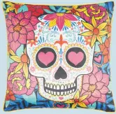  ??  ?? Sugar skull cushion, reduced from £6 to £4.80, George Home