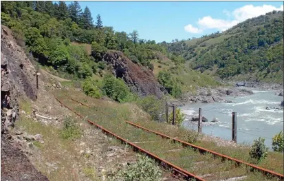  ?? WILL HOUSTON — THE TIMES-STANDARD FILE ?? The Great Redwood Trail will rehabilita­te approximat­ely 300miles of unused railroad line into hiking trails, but two companies want to keep rail service alive.