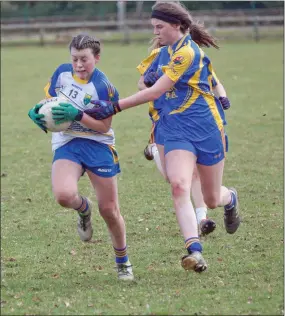  ??  ?? Wicklow’s Aoife Kavanagh (left) in action against Longford in the Leinster Under-16 football championsh­ip clash in Laragh last weekend. Photo: Paul Messitt