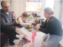  ??  ?? Six-year-old Lamitta El-Roz, who has cerebral palsy, shows off her dance moves with Leandra and parents Robbie El-Roz and Maya Taleb.