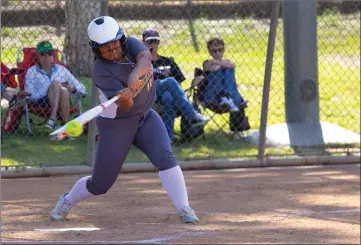  ?? Eddy Martinez/The Signal (See additional photos on signalscv.com) ?? Golden Valley’s Marissa Alcaraz takes a swing in a game against the Hart Indians at Hart High School on Tuesday. The Grizzlies won the game 10-6 to hang on to its second-place spot in the Foothill League.