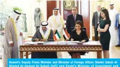  ??  ?? Kuwait’s Deputy Prime Minister and Minister of Foreign Affairs Sheikh Sabah AlKhaled Al-Hamad Al-Sabah (left) and Egypt’s Minister of Investment and Internatio­nal Cooperatio­n Sahar Nasr sign an agreement between the two countries.