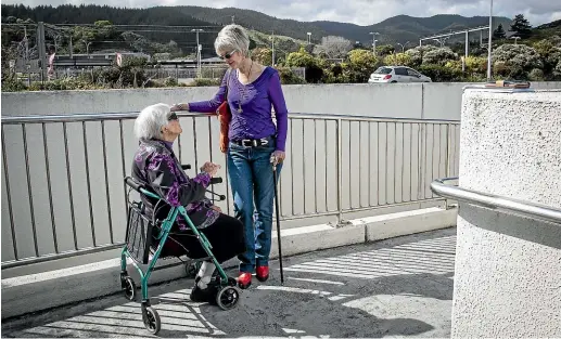  ?? ROSA WOODS/STUFF ?? Karen Butterwort­h, left, and Sandra Forsyth want to see access to the Wellington region’s railway stations improved.