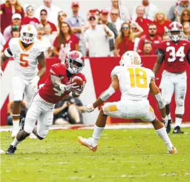  ?? ROBERT SUTTON/ALABAMA PHOTO ?? Alabama freshman receiver Jerry Jeudy comes up with a 19-yard catch midway through the second quarter of Saturday’s 45-7 thumping of Tennessee.
