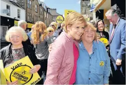  ??  ?? Delighted Ms Sturgeon met SNP supporters in Wellmeadow Street