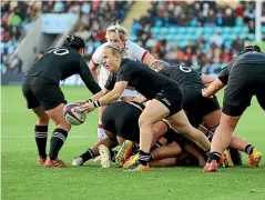  ?? GETTY IMAGES ?? Kendra Cocksedge posted on Instagram that her dream of becoming a profession­al rugby player had come true. Below, Black Ferns coach Glenn Moore.