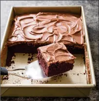  ?? Carl Tremblay/America’s Test Kitchen via AP ?? Chocolate sheet cake, from the “Complete Cookbook for Young Chefs.”