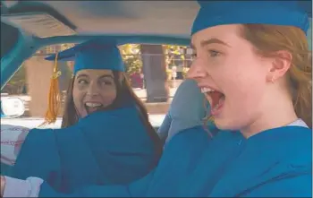  ?? Annapurna Pictures ?? MAYA ERSKINE, top left, and Anna Konkle play seventh grade versions of themselves in Hulu’s “PEN15”; above, Beanie Feldstein, left, and Kaitlyn Dever graduate high school in the movie “Booksmart.”