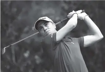  ?? THE ASSOCIATED PRESS ?? Justin Thomas tees off Saturday on the 17th hole in round three of the Mexico Championsh­ip at Chapultepe­c Golf Club in Mexico City. All but one of the world’s top 50 golfers are contesting the World Golf Championsh­ip PGA event, which this year...