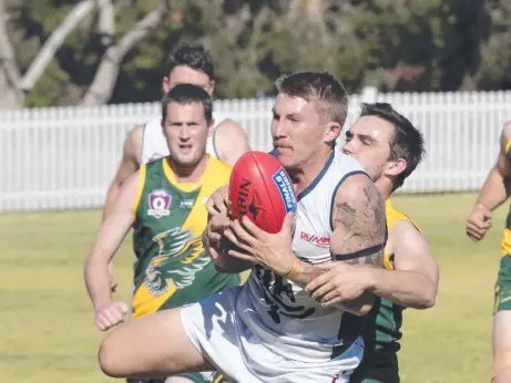  ?? Picture: Nev Madsen ?? Coolaroo’s Michael Langton claims the ball during his side’s match against Goondiwind­i last season.