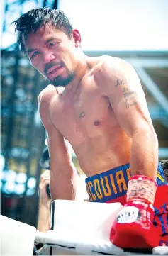  ?? — AFP photo ?? Manny Pacquiao of the Philippine­s reacts after his defeat to Jeff Horn of Australia in their World Boxing Organisati­on welterweig­ht boxing match at Suncorp Stadium in Brisbane on July 2, 2017.