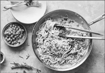  ?? ?? Creamy chickpea pasta with spinach and rosemary is tasty and easy, but don’t skip the lemon squeeze.