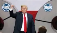  ?? JEFF ROBERSON — ASSOCIATED PRESS ?? President Donald Trump acknowledg­es the audience after speaking at the United States Steel Granite City Works plant in Granite City, Ill., on Thursday.