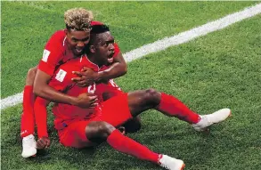  ?? JACK GUEZ / AFP / GETTY IMAGES ?? While critics have pointed to Panama’s 6-1 loss to England as a reason why an expanded World Cup will be watered down, players like Ricardo Avila and Jose Luis Rodriguez still found a positive this week with their country’s first goal in tournament...