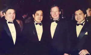  ??  ?? With (from left) Tony Garcia, Ronnie Puno and Sen. Mitch McConnell during the 1989 inaugural ball of President George H. W. Bush.