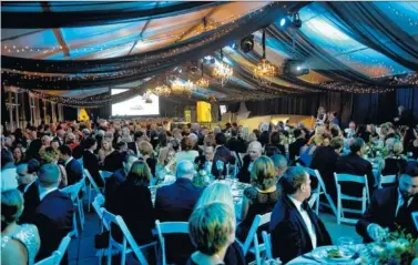  ?? CONTRIBUTE­D PHOTOS ?? Gala attendees enjoy a seated dinner, a live auction and a party.