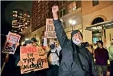  ?? AP ?? A protester raises his arm as he becomes emotional during a rally and march in Oakland, California. The Anti Police-terror Project organised the march in response to the death of Tyre Nichols. —