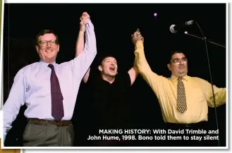  ?? ?? MAKING HISTORY: With David Trimble and John Hume, 1998. Bono told them to stay silent