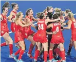  ??  ?? JOLLY HOCKEY STICKS Joy as the women’s team wins gold in a dramatic penalty shootout